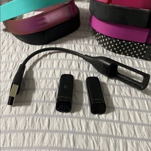 Fit-bits x2 and Interchangeable bracelets (x8)